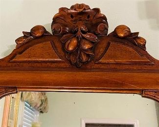 #100 - $195 Walnut lovely mirror with fruit carving on top  • 20 x 33 