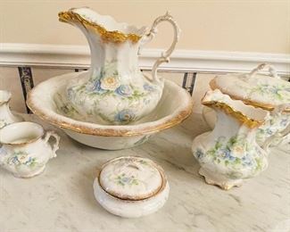 #112 - $240 - English ironstone wash set (7 pieces) Blue and yellow roses gold edge. (7 pieces) 
Washbasin  • 6high 15across 
large pitcher • 12high 10across 
small pitcher • 8high 6across 
chamber with lid •  6high 10across
small vase • 5high 4across 
Carafe 4high • 5across
Soap dish– three pieces • 4high 6across 