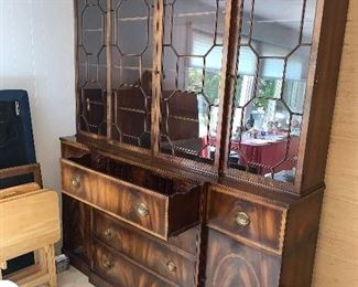 Well maintained antique breakfront cabinet with top-drawer pull-out secretary desk  