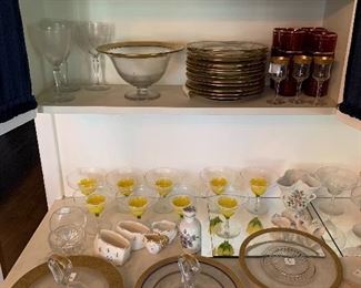 Gold rimmed plates, goblets, stemware