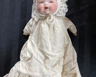 Antique baby doll with hand made original clothes