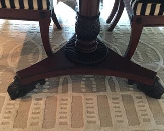 PEDESTAL BASE.  TABLE SITS ON AREA RUG BY SAFAVIEF  94 X 130  