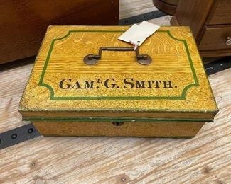 Antique painted metal box with key