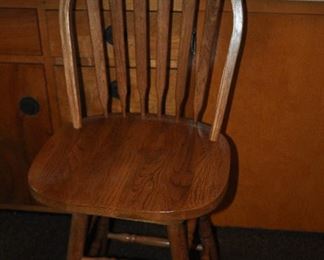 One of 4 swivel bar chairs