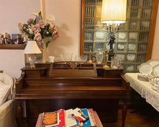 Janssen Piano, vintage angel lamp, Waterford Crystal lamp, Yugoslavia Crystal Vase and Silk Flowers, Waterford Crystal Pitcher and other pieces.