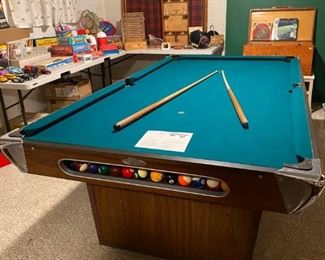 Check out this vintage Sportcrest Champion Pool Table. It is lightweight compared to other pool tables and has that cool 50's look. 