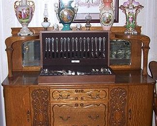 Beautiful oak buffet, set of flatware, etc...