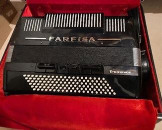 Black Farfisa Tronsivox piano accordion with case.