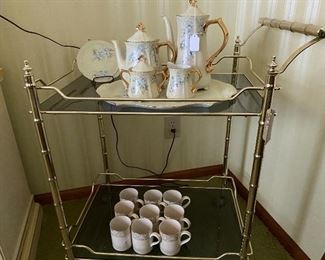 Metal and glass teacart (teacart still available) with (beautiful Tea/coffee/Chocolate set/Japan sold ) and Royal Doulton coffee mugs.  New Romance 'Gabrielle'.