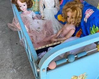 vintage metal doll crib (sold). vintage Alexander doll and American Character doll
