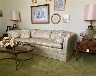 Sofa, end table, coffee table, table lamps, and more.