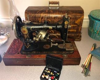 That is a cool sewing machine. Probably used to make those quilts and kids clothes!