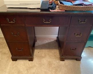 Vintage mahogany desk with glass top