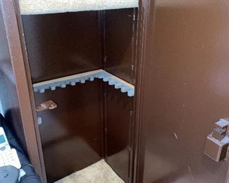 Metal gun cabinet or safe. Mounted to the concrete. Purchaser must remove. No guns - family kept them. 