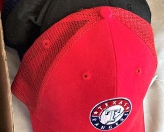 Ball caps . .  including a Texas Ranger cap