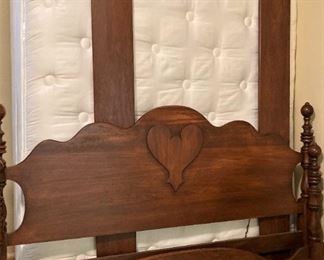 Full headboard and footboard has coordinating vanity
