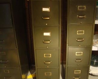 Several vintage 4-drawer file cabinets