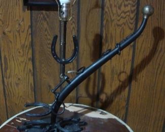 Lamp with welded horseshoes