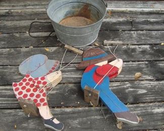 Galvanized bucket, boy & girl on swing