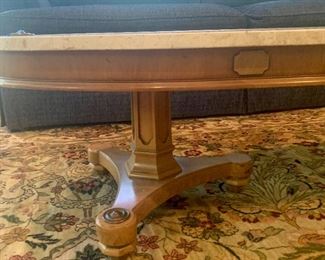 #23- Vintage oval coffee table with marble top- 68l x 26w x 16t- $60