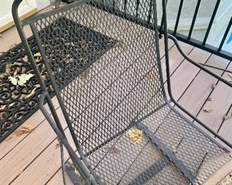 #26- Wrought iron table and 4 chairs w/ umbrella- $200