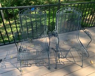 #28- 4 wrought iron rocking chairs- $100