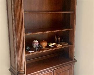 #46- Carved wooden lighted bookshelf with cabinet- 46w x 15 1/2d x 82t- $260