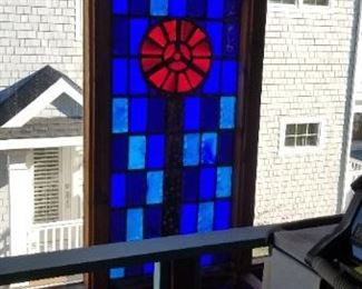 Two-story tall stained glass window