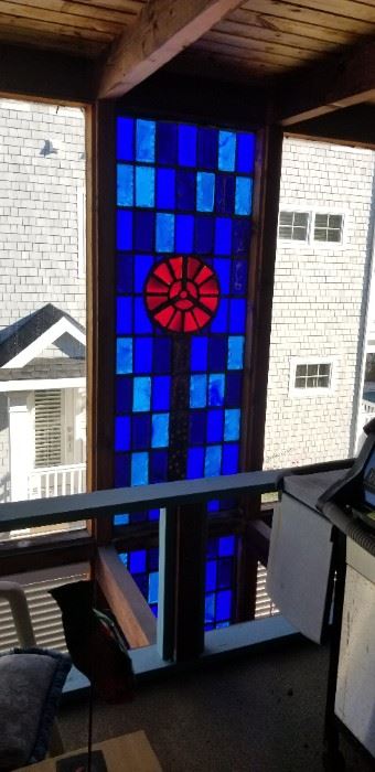 Two-story tall stained glass window