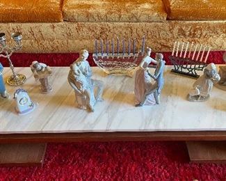 Both Menorahs, the coffee table, the dancing couple, the eskimo and clock are sold.