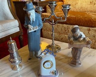 The Rabbi is Nad and the Boy and clock are Lladro.