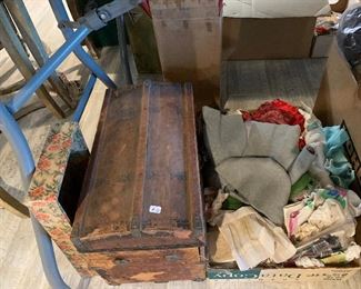 Antique doll trunk (with tray inside) and another box of old doll clothes.