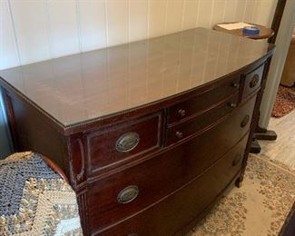 Bowfront mahogany lowchest.