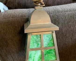 Stunning hanging slag glass and brass arts and crafts light.