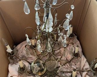 Gorgeous antique French crystal and brass chandelier. Wish it showed better how pretty it really is.