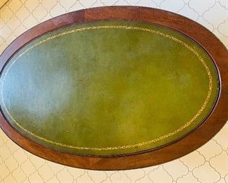 $195    13/ Drexel Grand Palais oval green leather coffee table brass band, Bamboo style legs •  17high 46 wide 28 deep
