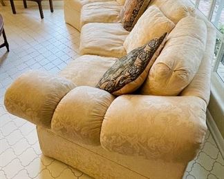$275    17/ Drexel Heritage cream damask sofa (one
stain on arm) •  40high 126wide 48deep