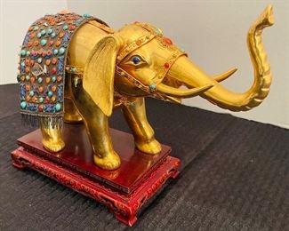 $95   39/Elephant gold with multi small stones on stand  •  8 x 13 