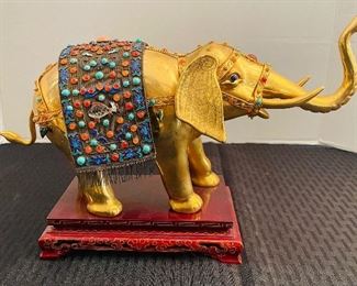 $95   39/Elephant gold with multi small stones on stand  •  8 x 13 