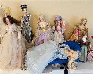 34/ Franklin Heirloom dolls   •  all over 13high
$20   Little BooPeep
$90   Snow queendoll
$28   Cinderella
$28   Glenda Good witch   
$16   Egyptian doll with broken arm 