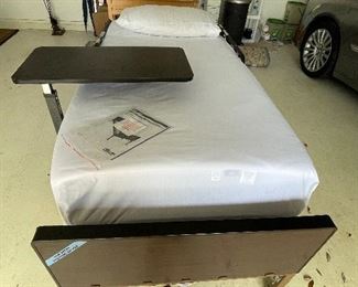 #125 - $150 Hospital bed, almost brand new and tray table 