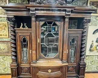 #31 - $1,600 Large Continental oak cabinet with lead glass doors and side storage • 94high 97wide 26deep