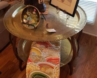 Tiered brass table, decor