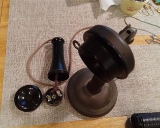 A reproduction candle stick phone dated from the 1950's,