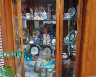 Beautiful curved glass curio corner cabinet, Display Case, super clean and modern,... Share your collecting passion...