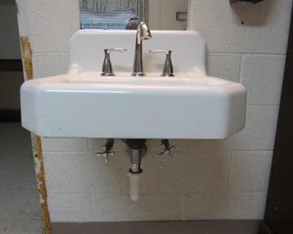 Vintage sink. Building is mid century era. There's many many really nice vintage 50s era sinks throughout the building. Perfect if you have an antique shop and like to sell vintage salvaged items. Also great for farmhouse decor or a garden shed