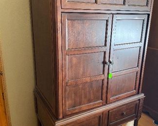 Armoire can be used for tv entertainment center or wardrobe closet