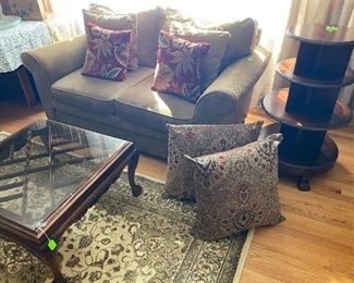 Sofa with two sets of pillows