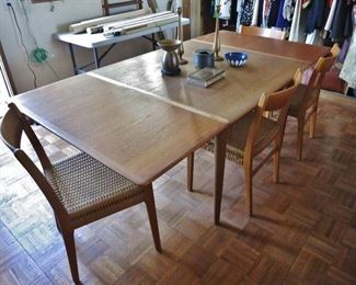 Danish Mid-Century Modern Teak Dining Set designed by Arne Hovman-Olsen for Skovmand & Andersen. Two Extendable Leaves 