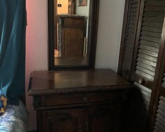 There are 2 of these night stands and mirrors exactly alike.